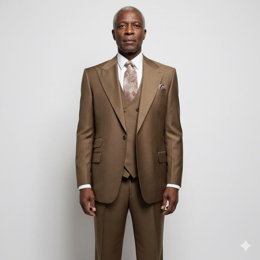 In a concrete-walled room, a mannequin is attired in a Tiglio Rosso Orvietto Solid Tobacco single-pleat three-piece suit paired with a patterned tie.