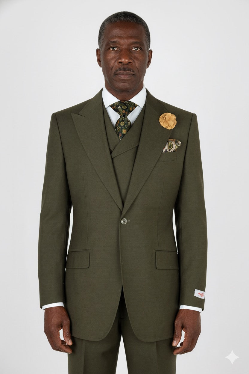 A mannequin dressed in a Tiglio Rosso San Giovesse Solid Olive suit with a patterned tie, pocket square, and flower lapel pin. The wide leg fit adds an extra touch of sophistication to this stylish ensemble.