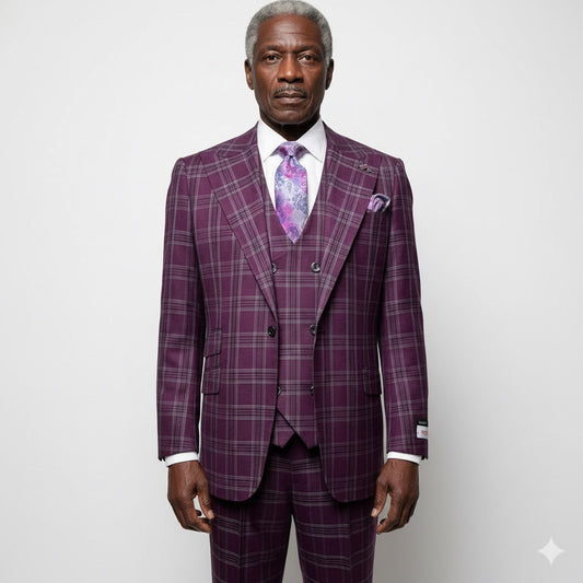 An older man stands against a plain background, wearing the Tiglio Rosso Orvietto Burgundy / Grey TL6336 suit with a matching vest, white shirt, and floral tie, showcasing the classic wide leg fit typical of Tiglio Rosso.