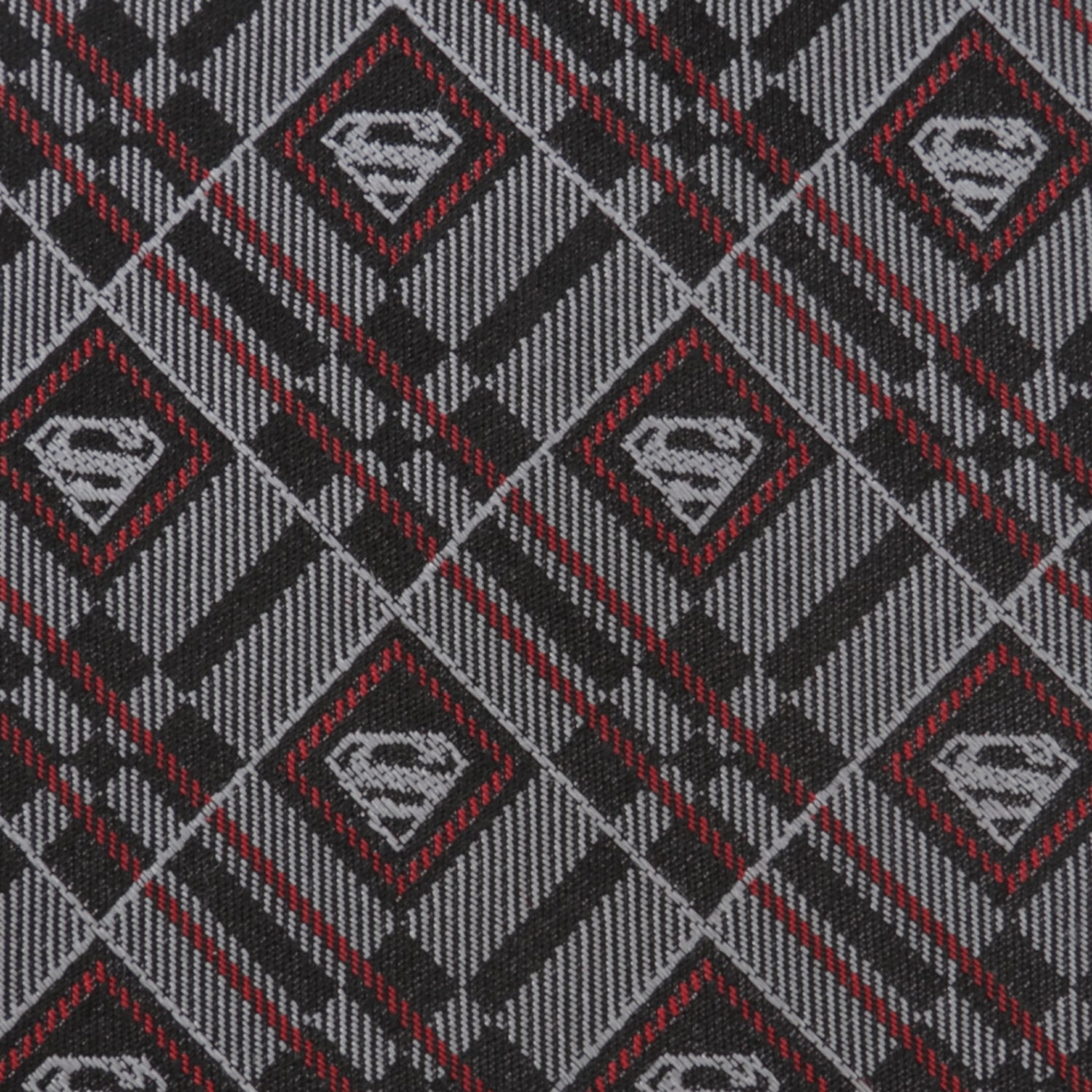 The DC Superman Geometric Gray Silk Men's Tie by Cufflinks.com is a rolled-up silk tie featuring a geometric plaid pattern with diamond-shaped accents in gray.