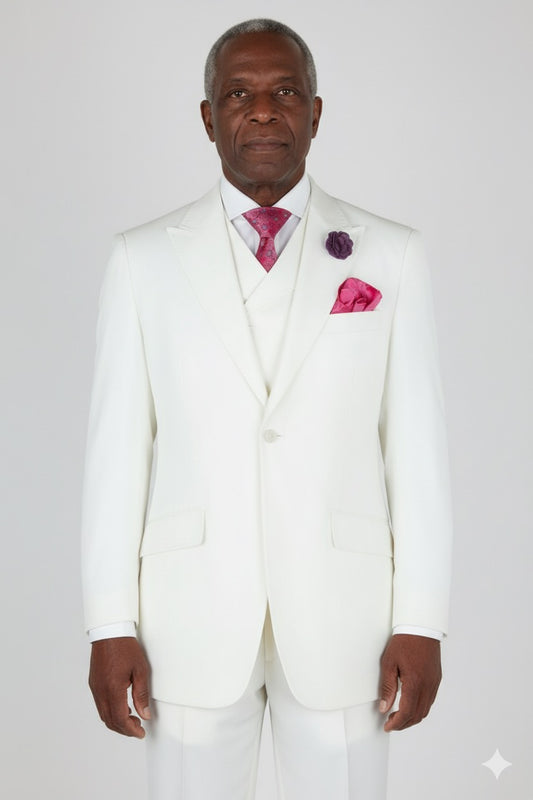 The Tiglio Rosso San Giovesse Off White tuxedo is a stunning ensemble featuring a matching vest and pink tie, pocket square, and boutonniere. Combining the refined elegance typical of three-piece suits, this tuxedo from Tiglio Rosso is perfect for making a stylish statement.