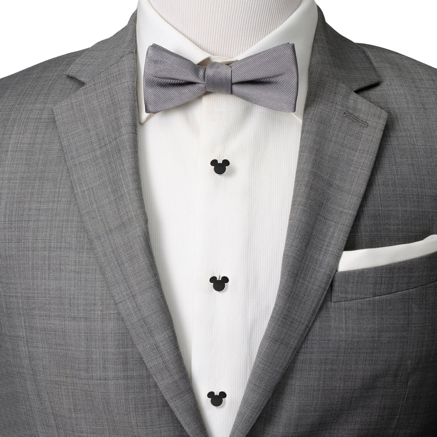 The Disney Mickey Mouse Silhouette 5-Stud Set by Cufflinks.com features silver and black cufflinks and shirt studs shaped like Mickey Mouse, arranged in rows on a white background.