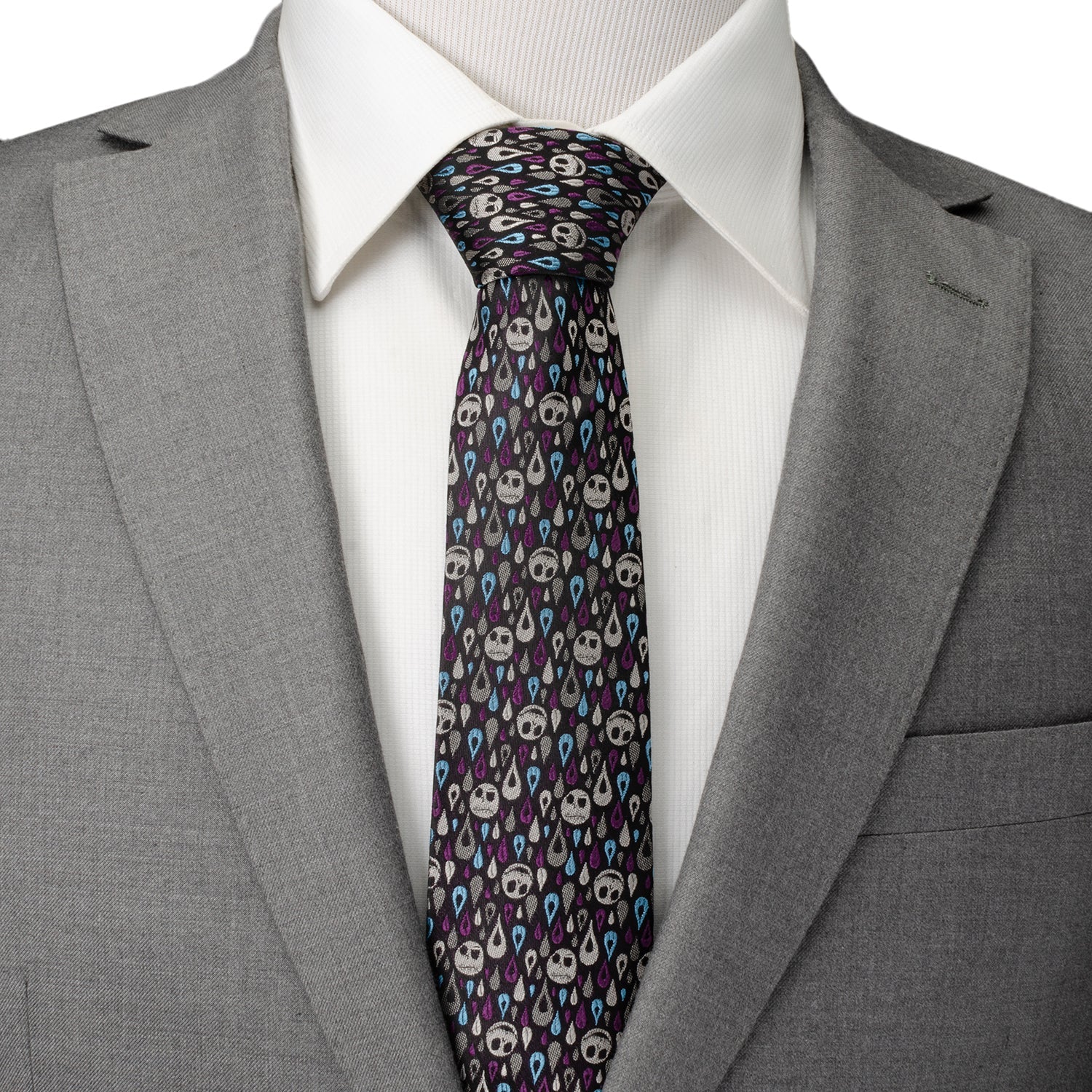 The Disney The Nightmare Before Christmas Jack Skellington Patterned Men's Tie by Cufflinks.com features a black silk blend with white skulls and blue and purple teardrops—perfect for fans seeking a unique accessory.