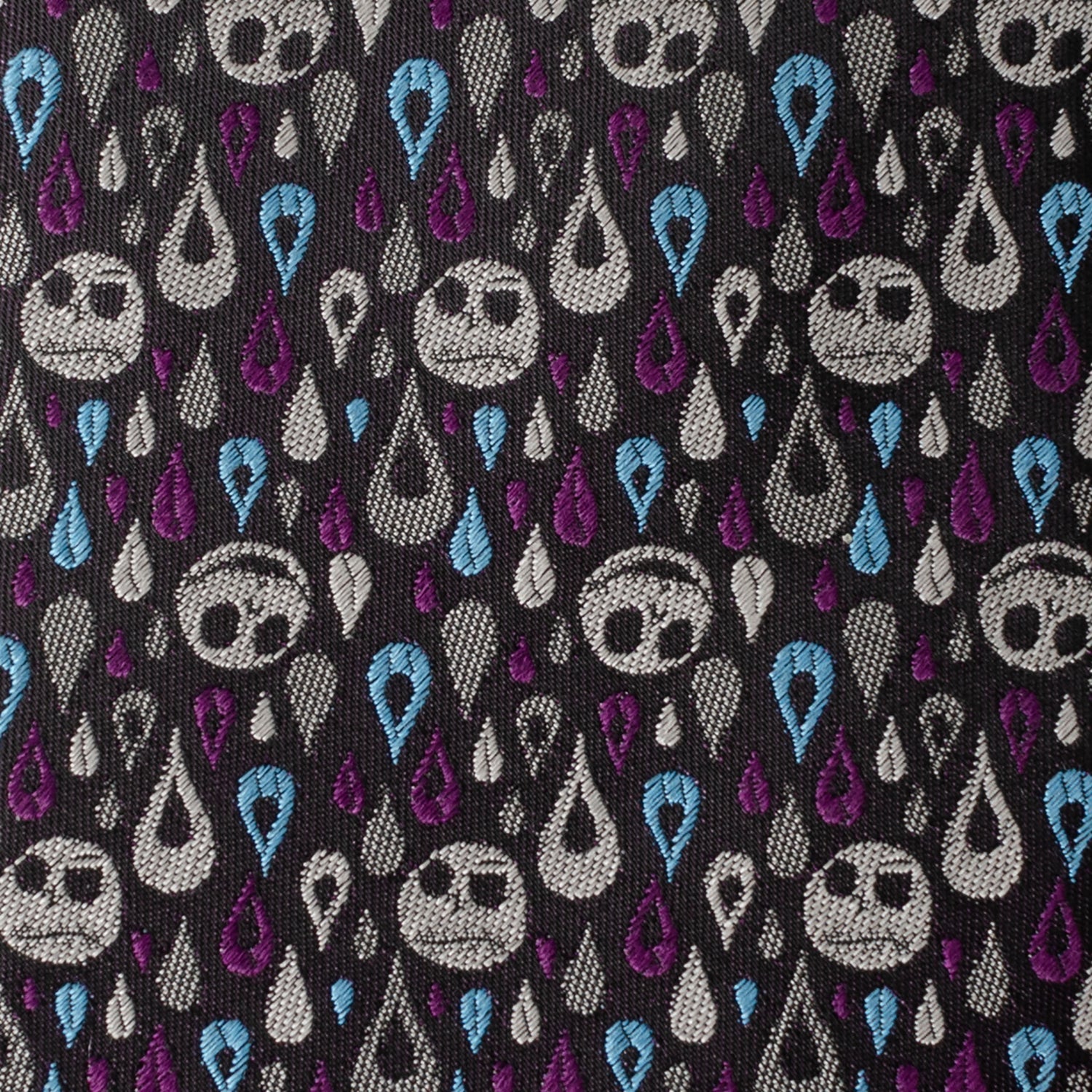 The Disney The Nightmare Before Christmas Jack Skellington Patterned Men's Tie by Cufflinks.com features a black silk blend with white skulls and blue and purple teardrops—perfect for fans seeking a unique accessory.