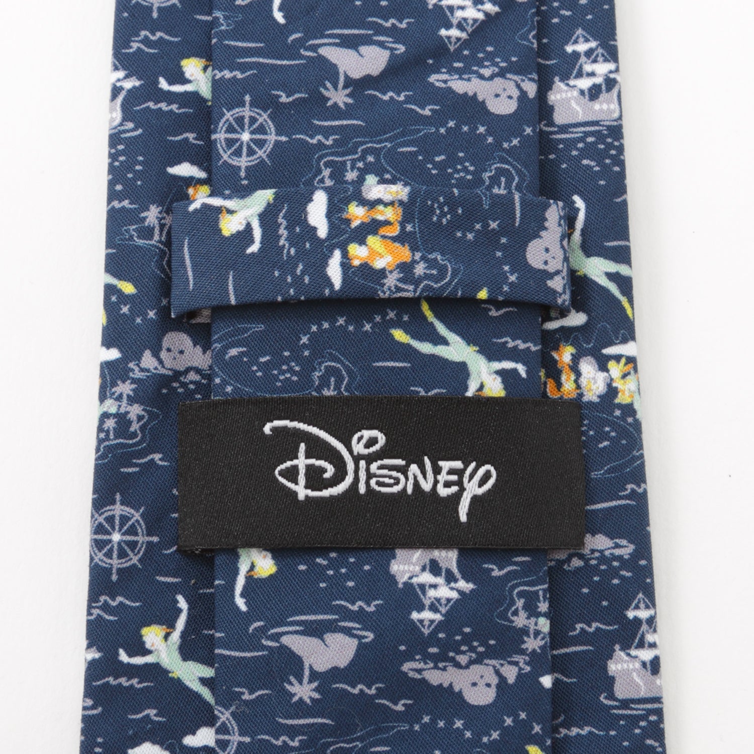 The Disney Peter Pan Flying Blue Men's Tie by Cufflinks.com features a vibrant, whimsical Peter Pan, pirate ship, and nautical motif—an ideal magical Disney accessory for fans.