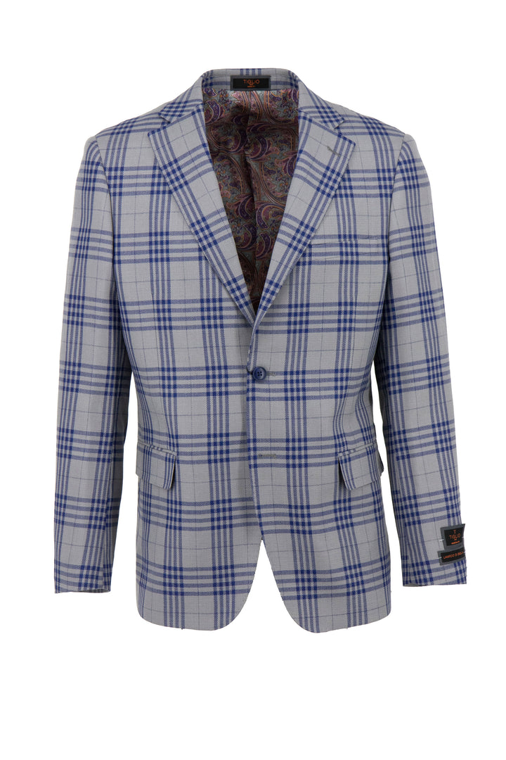 The Tiglio Luxe Gray with Navy Windowpane Dolcetto TL4269 is a modern fit, pure wool jacket that combines Italian fabrics with classic European style, featuring an elegant paisley lining and sophisticated two-button closure.