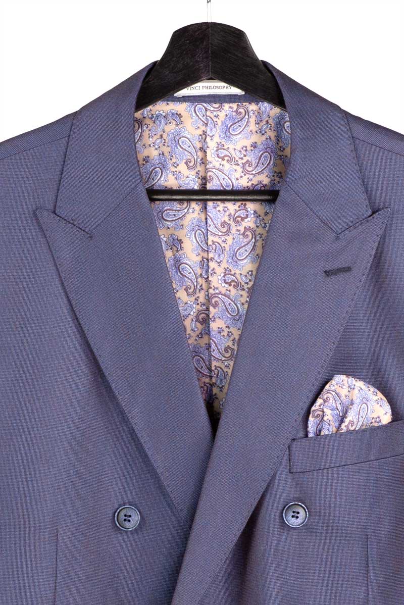 Mannequin in Vinci Suits’ Regular Fit Dusty Purple Double Breasted 2 Piece Sharkskin Suit with Adjustable Waistband Pants DRK-5, styled with a light shirt and purple tie.