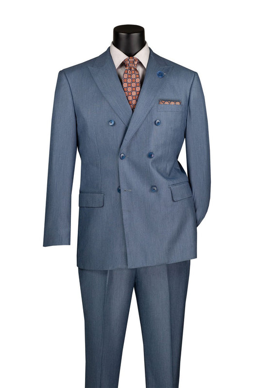 A mannequin showcases the Vinci Suits Regular Fit Smoke Blue Double Breasted 2 Piece Sharkskin Suit with Adjustable Waistband Pants DRK-5, paired with a white shirt and tie.