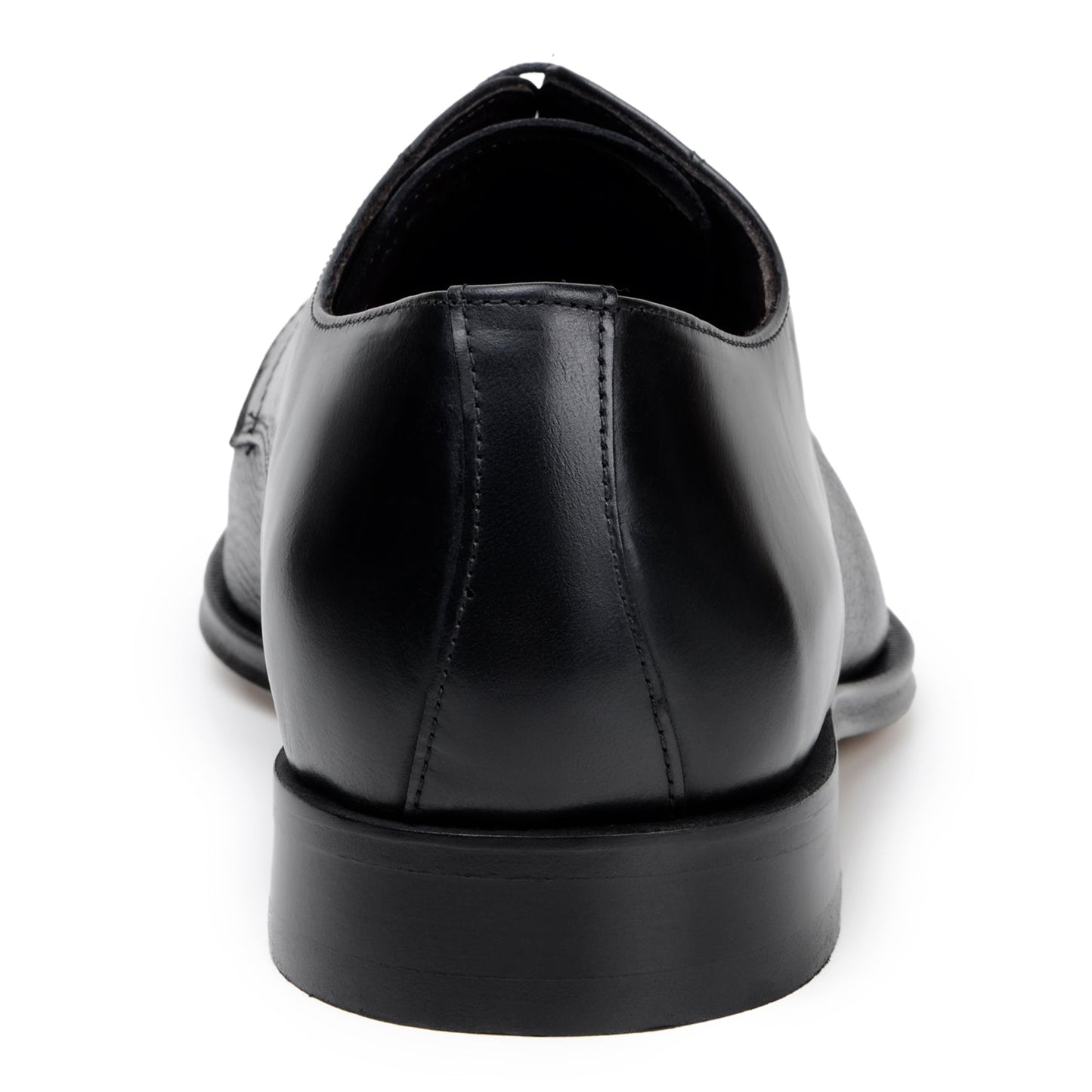 The BELVEDERE Alexander is a black men's dress shoe made of genuine Italian deerskin and calf, featuring a cap toe, lace-up closure, and low heel. Handcrafted in Brazil, shown in side profile on a white background.