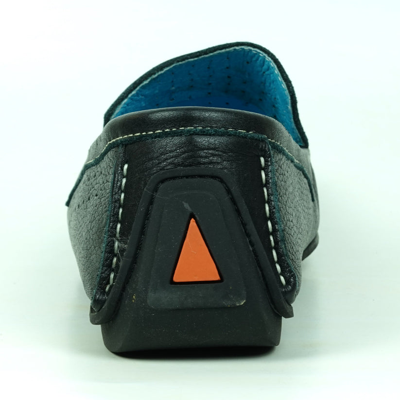 The FI-4001 Black Fiesso By Aurelio Garcia by Fiesso is a black slip-on leather loafer with white stitching and a blue inner lining, featuring a cushioned insole for added comfort, displayed on a plain white background.