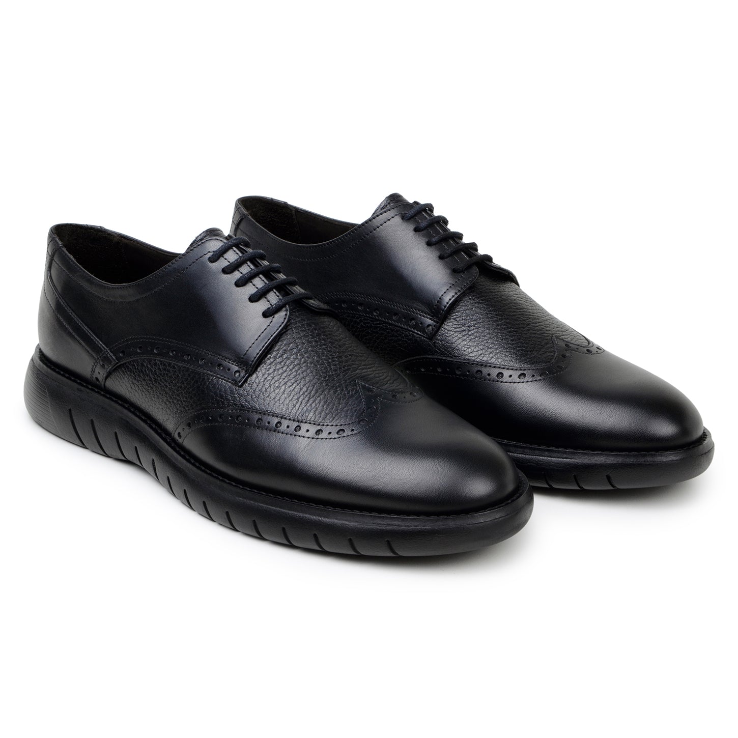 The BELVEDERE Belvedere - Enzo is a black genuine leather shoe with brogue detailing, lace-up closure, a thick textured rubber sole, and a cushioned insole for comfort, displayed in profile against a white background.