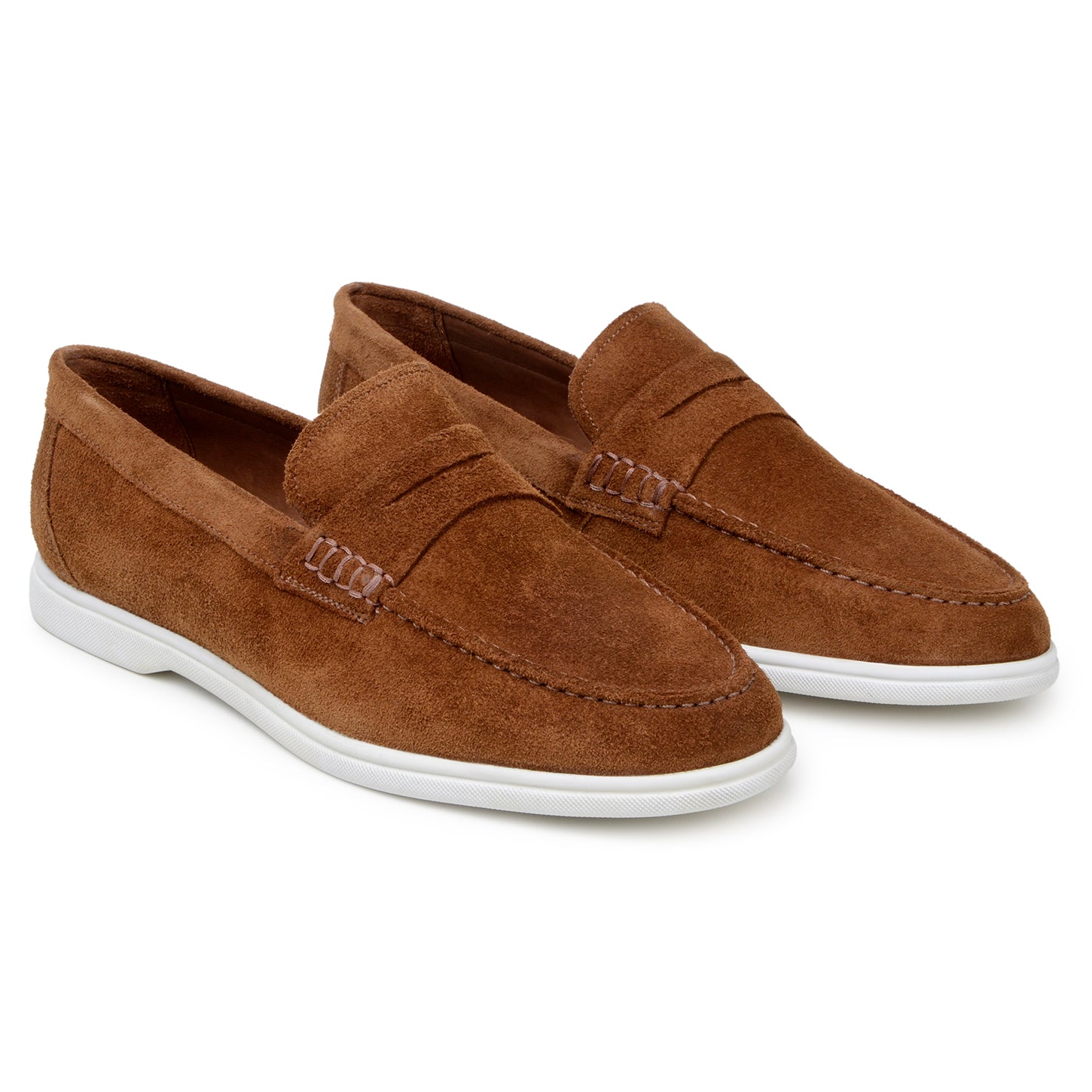 The BELVEDERE Belvedere - Niko Italian Suede Penny Loafer in Bourbon features brown suede, a white rubber sole, stitched side detail, and a low heel. This lightweight dress shoe is displayed on a plain white background.