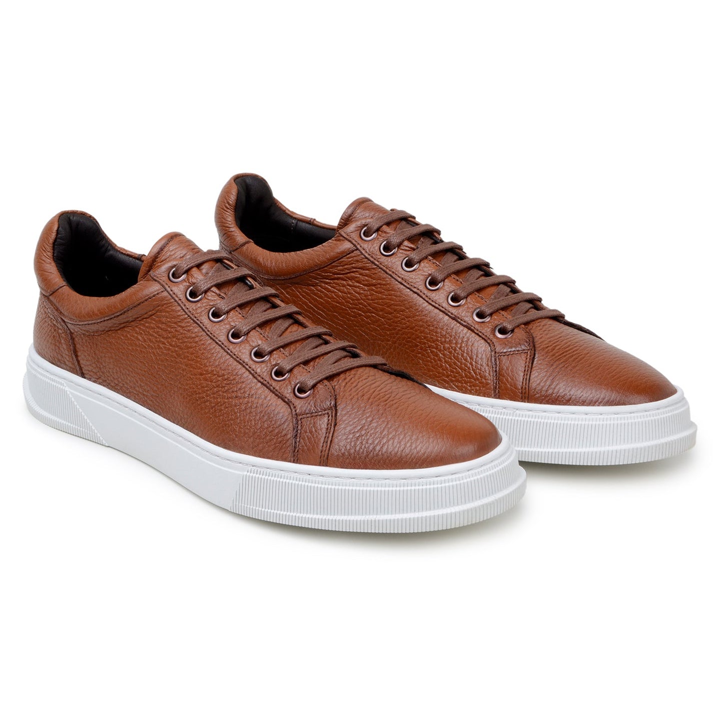 The BELVEDERE Matteo sneaker in Ant. Tan features genuine deerskin leather with a textured finish, cushioned insole, white rubber sole, and brown laces, shown from the side on a plain background.
