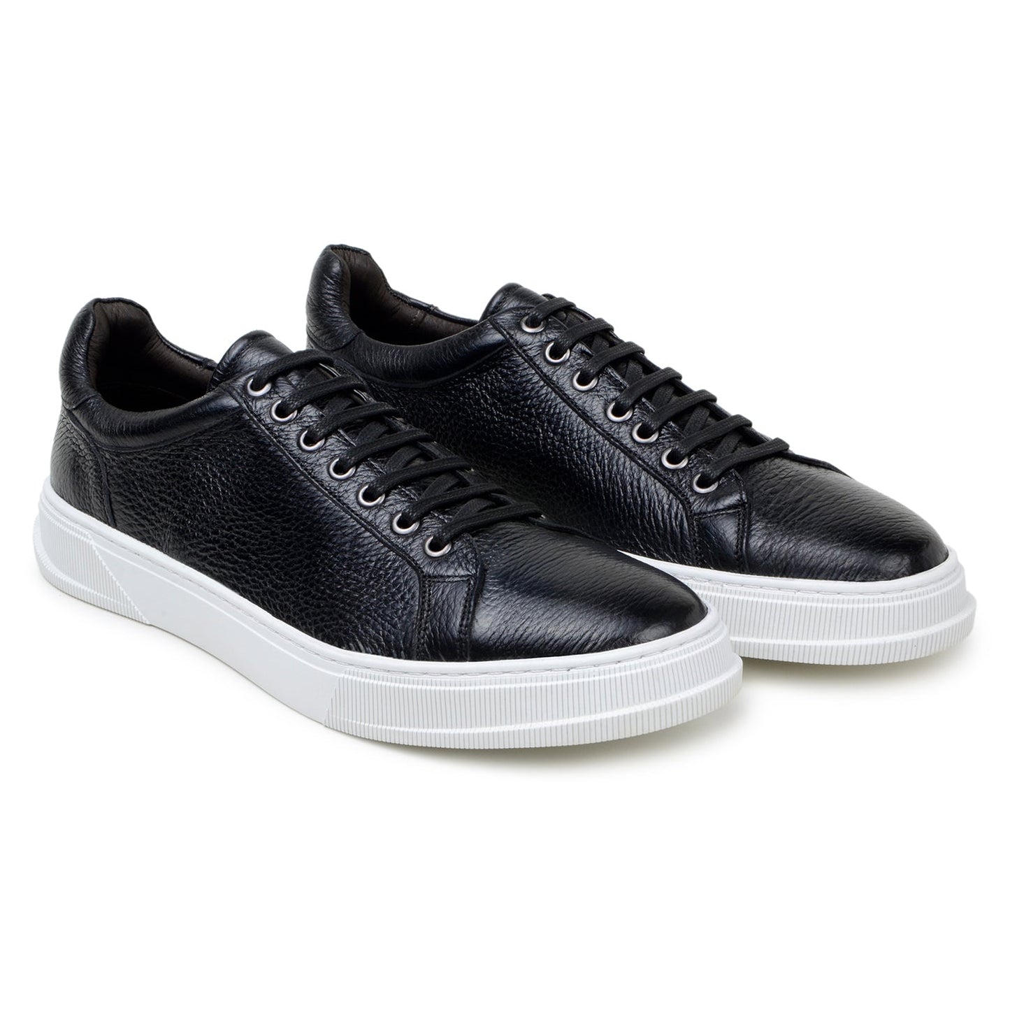 The BELVEDERE Matteo is a black genuine deerskin leather low-top sneaker with black laces, a white rubber sole, and cushioned insole, pictured in side profile against a plain white background.