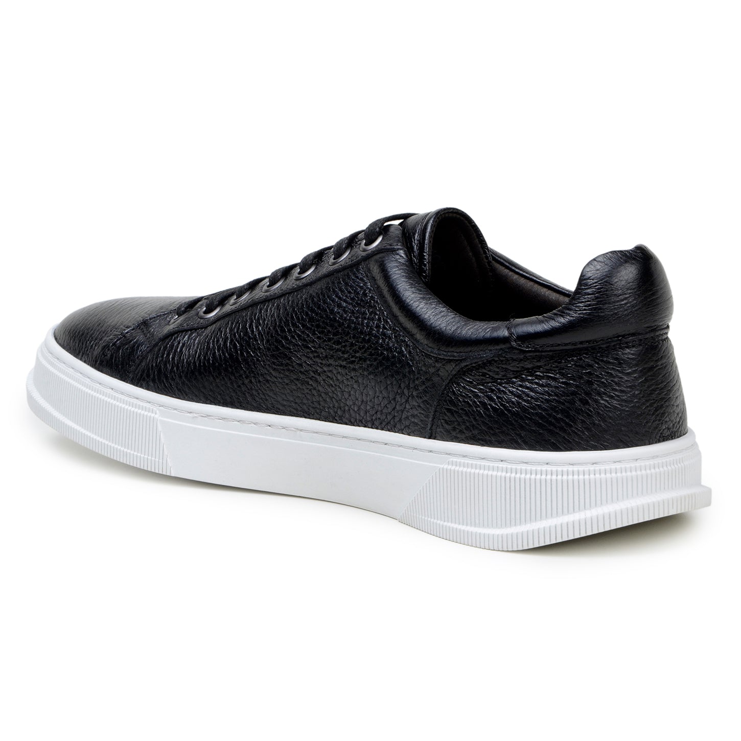 The BELVEDERE Matteo is a black genuine deerskin leather low-top sneaker with black laces, a white rubber sole, and cushioned insole, pictured in side profile against a plain white background.