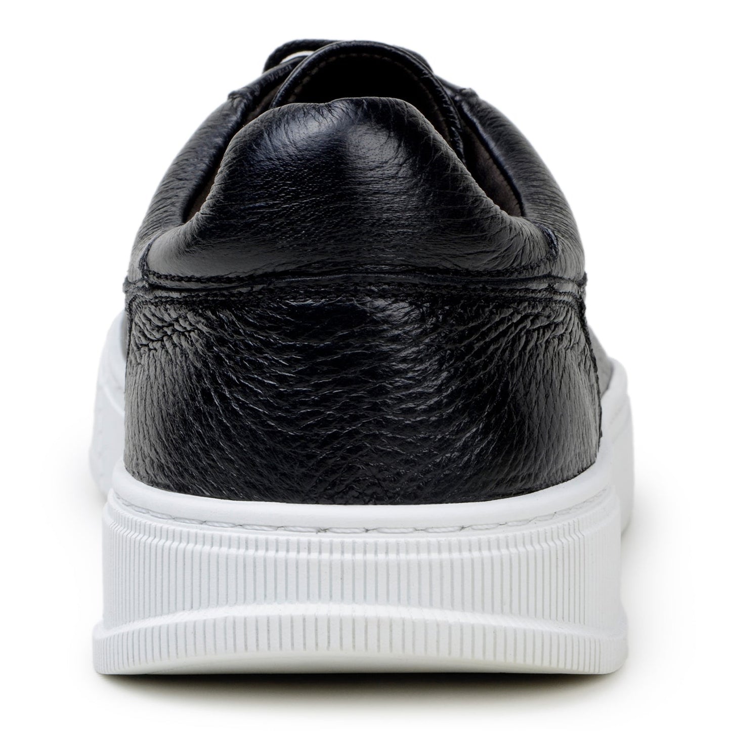 The BELVEDERE Matteo is a black genuine deerskin leather low-top sneaker with black laces, a white rubber sole, and cushioned insole, pictured in side profile against a plain white background.