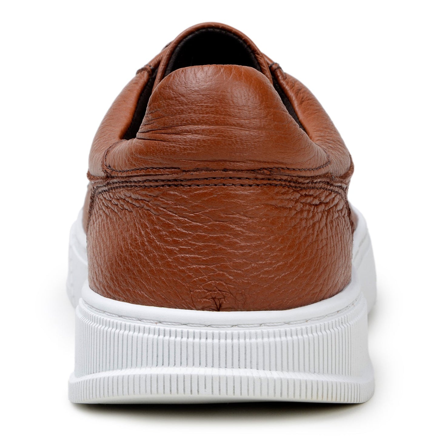 The BELVEDERE Matteo sneaker in Ant. Tan features genuine deerskin leather with a textured finish, cushioned insole, white rubber sole, and brown laces, shown from the side on a plain background.