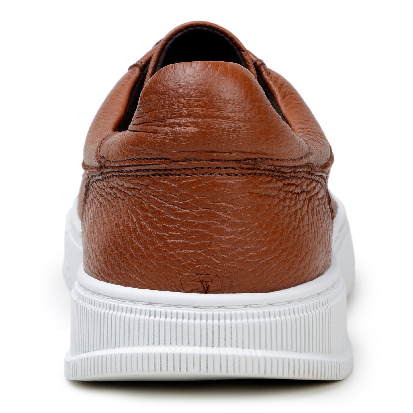 The BELVEDERE Matteo sneaker in Ant. Tan features genuine deerskin leather with a textured finish, cushioned insole, white rubber sole, and brown laces, shown from the side on a plain background.