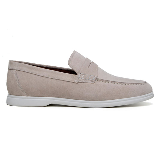The BELVEDERE Belvedere - Niko Italian suede penny loafer in sand features a white rubber sole, moccasin-style stitching, and low heel—ideal lightweight slip-ons for men's loafer collections. Shown side profile on white background.