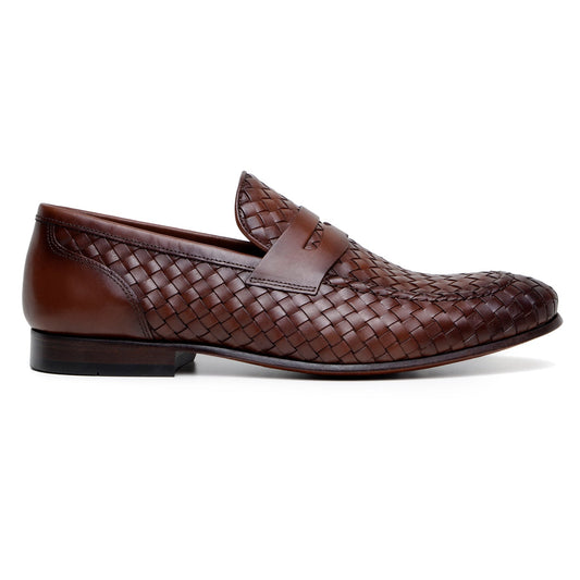 The BELVEDERE Belvedere - Luca Woven Calf Penny Loafer in Antique Tan features Italian woven calf leather, a low heel, and rounded toe, displayed in side profile against a white background.