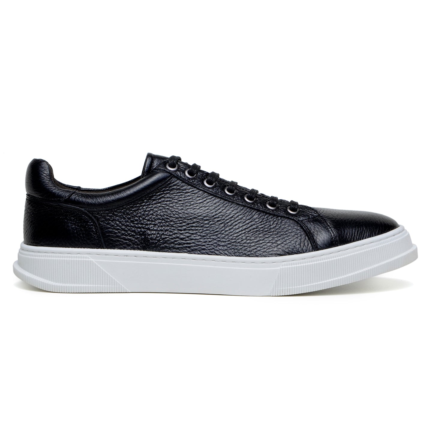 The BELVEDERE Matteo is a black genuine deerskin leather low-top sneaker with black laces, a white rubber sole, and cushioned insole, pictured in side profile against a plain white background.