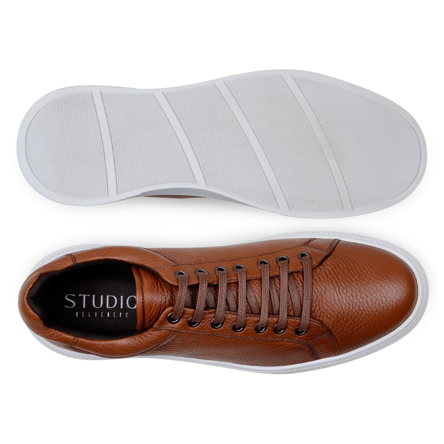 The BELVEDERE Matteo sneaker in Ant. Tan features genuine deerskin leather with a textured finish, cushioned insole, white rubber sole, and brown laces, shown from the side on a plain background.
