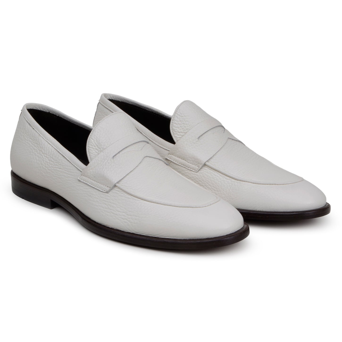 The BELVEDERE Nohr is a genuine Italian deerskin dress shoe in white, handcrafted in Brazil with a low black heel, shown from the side against a plain background.