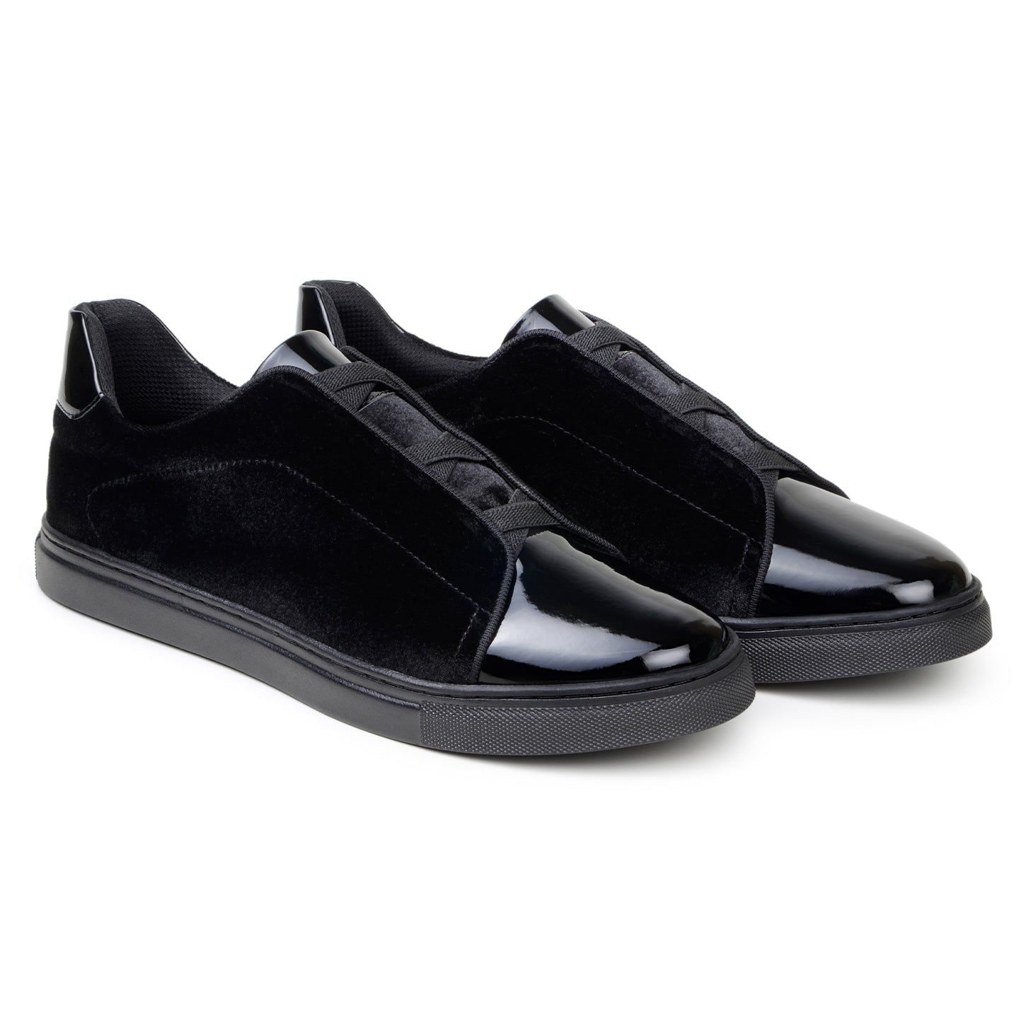 The BELVEDERE Belvedere - Silvano is a black low-top sneaker featuring velvet and patent leather uppers, glossy toe caps, and black soles, shown against a white background.