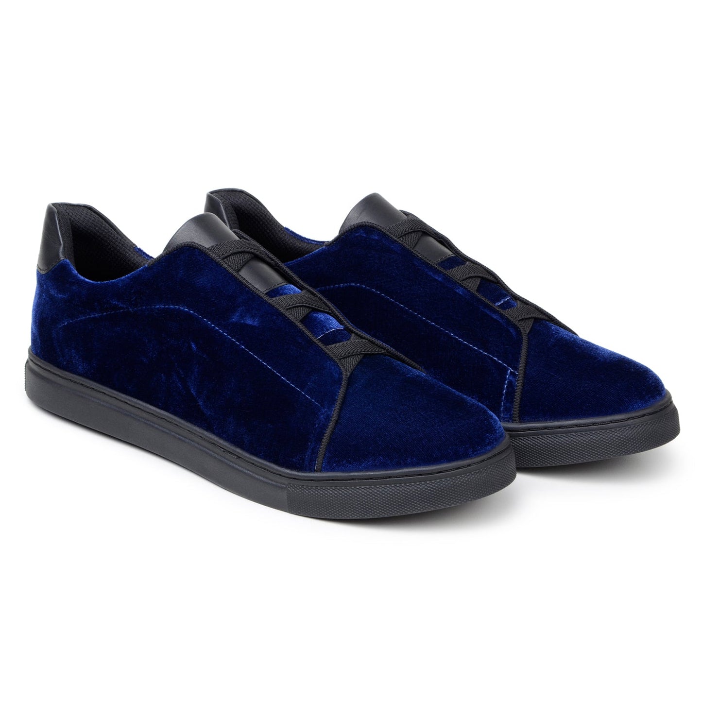 The BELVEDERE Eros is a navy premium velvet low-top sneaker with black laces, a black leather heel detail, and a black rubber sole, shown in a sleek side profile.