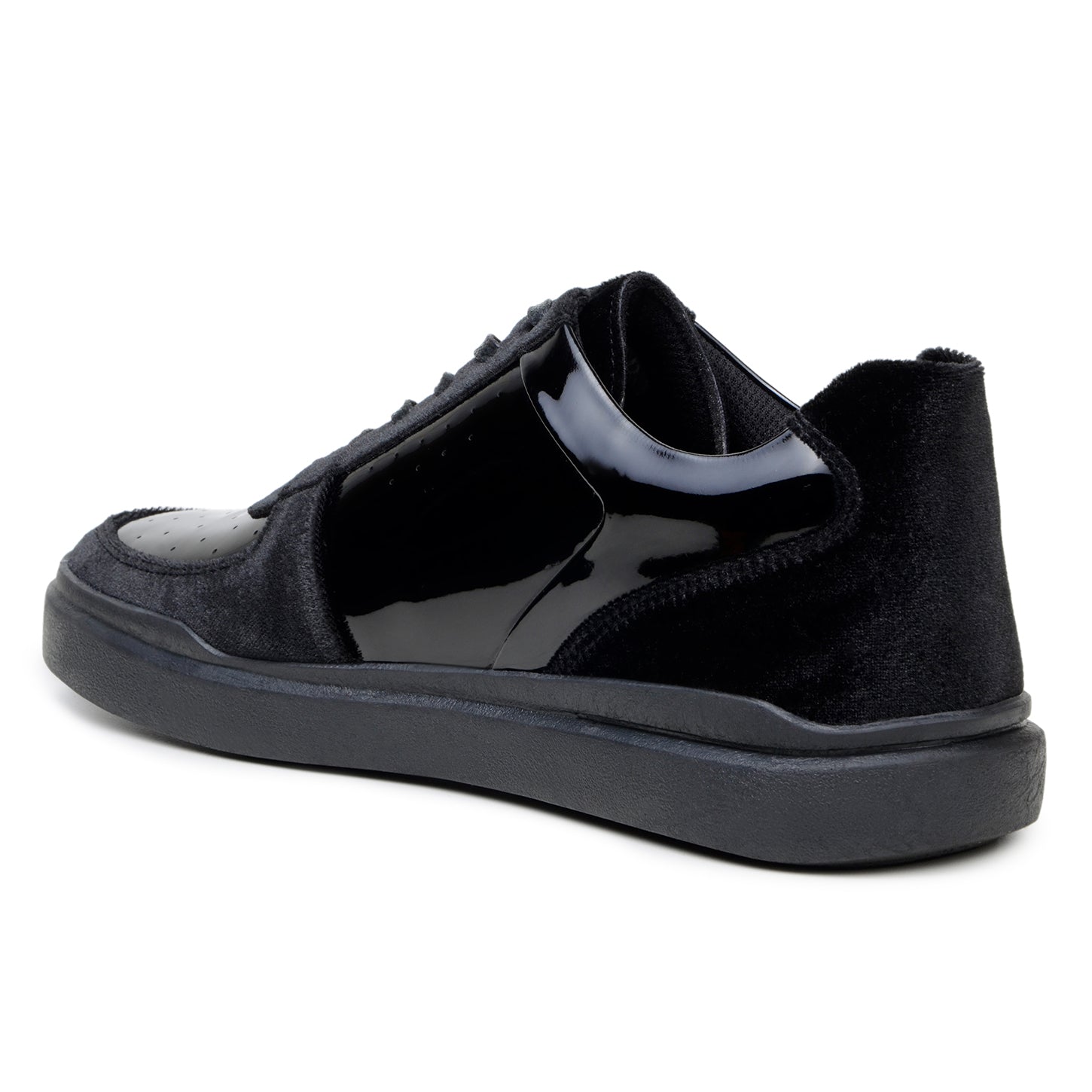 The BELVEDERE Edmound is a black low-top sneaker in patent leather and velvet, featuring glossy side panels, matte suede accents, black laces, and a rubber sole. Available in size 9.5 and 11.5 only. IN STORE FINAL SALE.