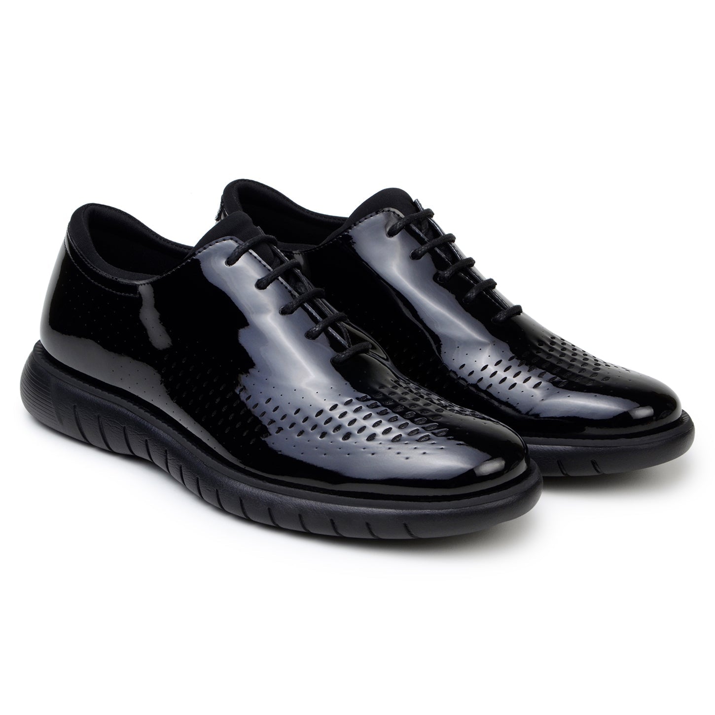 The BELVEDERE Belvedere - Maxim Laser Cut Wingtip Sneaker in black features shiny patent leather, perforated sides, wingtip detailing, and a textured rubber sole, shown in side profile on a white background.