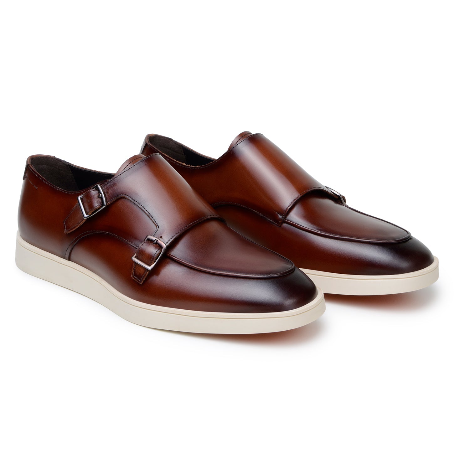 The BELVEDERE Belvedere - Marcio Hybrid Double Buckle Dress Shoe in cognac features two buckles and a white rubber sole, crafted in Brazil and displayed in a side profile view against a white background.