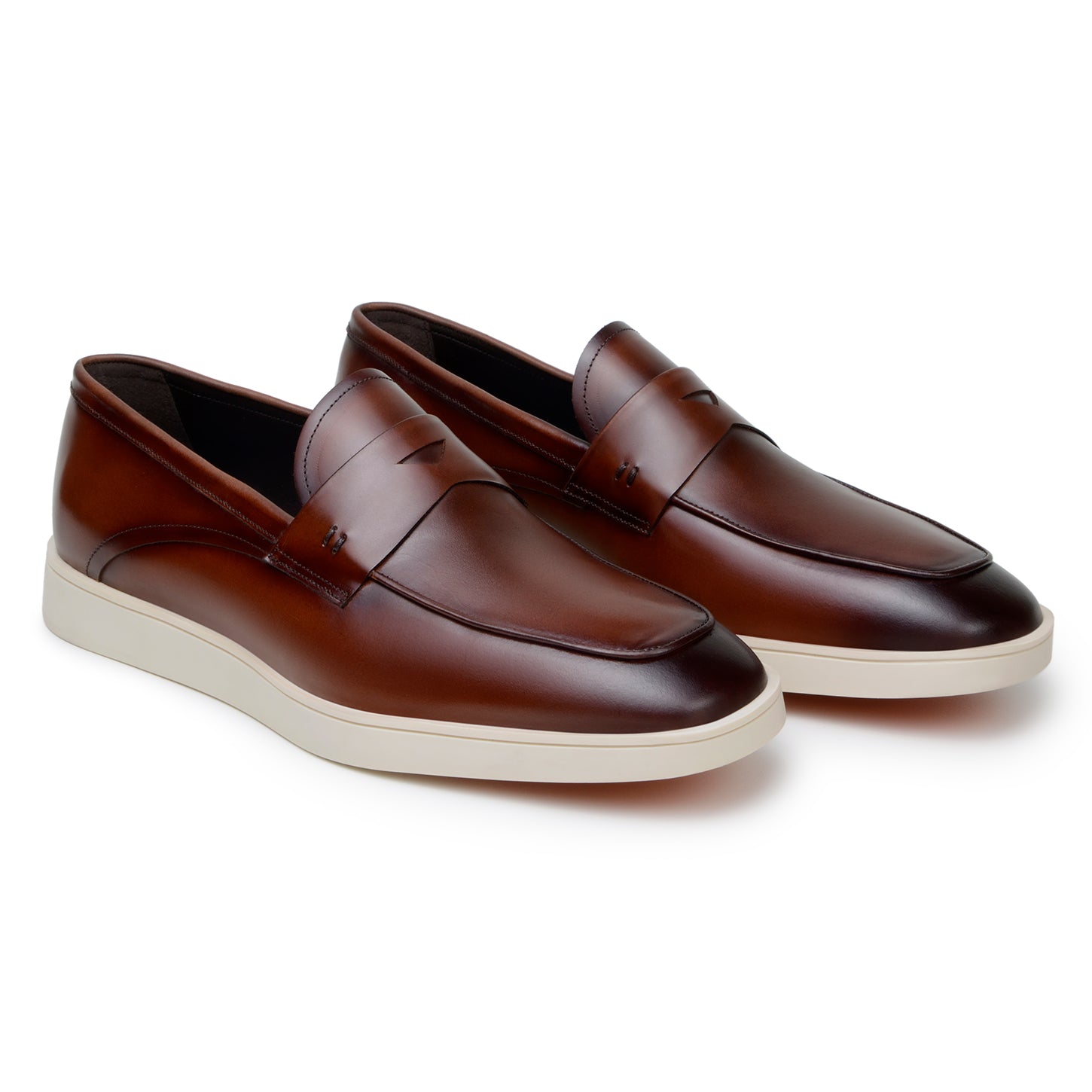A pair of BELVEDERE Belvedere - Maurizio Hybrid Penny Loafer Shoes in cognac Nappa leather with white rubber soles, made in Brazil, are displayed side by side on a white background.