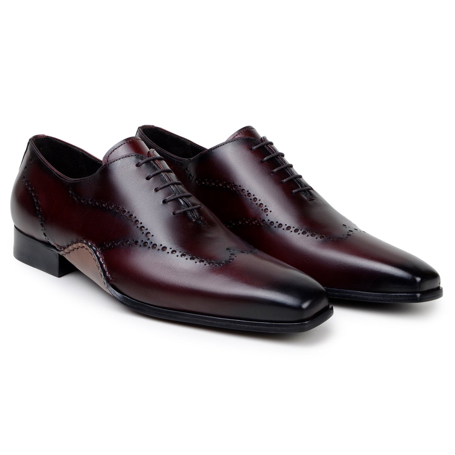 The BELVEDERE Otto is an Italian calf leather dress shoe in antique burgundy, featuring decorative perforations, a low heel, and a polished finish; shown here in profile view.