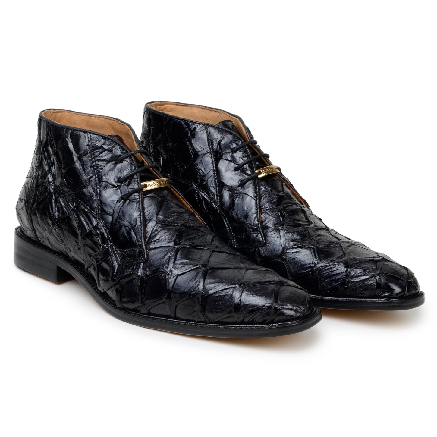 The Belvedere Ciro boots are made from genuine black Pirarucu leather, handcrafted in Brazil, featuring a low heel and closed lacing, shown in profile against a white background.