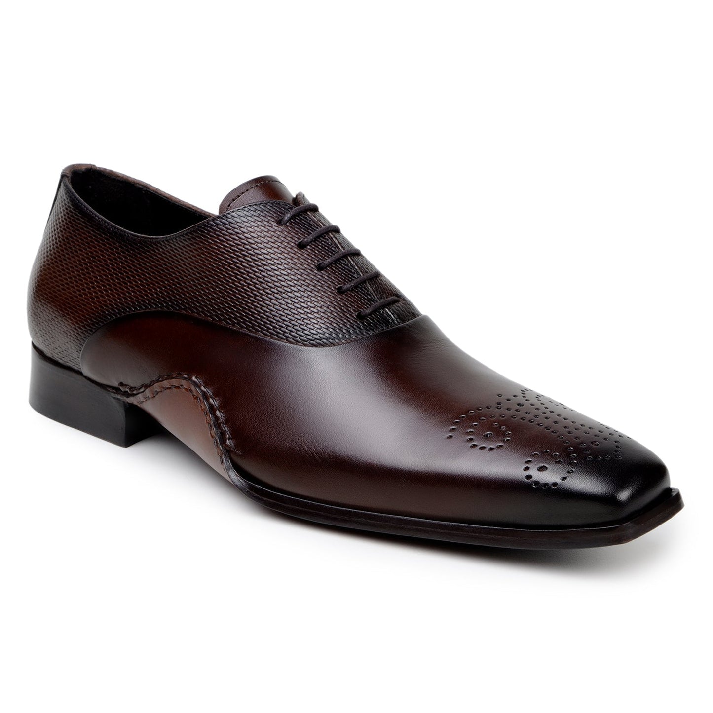 The BELVEDERE Saggio is an Ant. Tobacco Italian calf leather dress shoe with textured panels, toe perforations, a low heel, and handcrafted in Brazil with fine Opanka construction.
