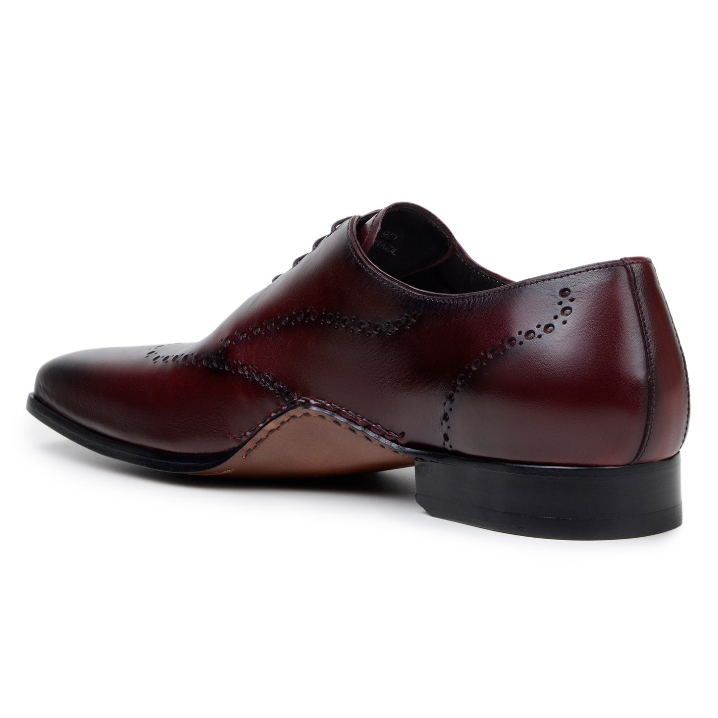 The BELVEDERE Otto is an Italian calf leather dress shoe in antique burgundy, featuring decorative perforations, a low heel, and a polished finish; shown here in profile view.