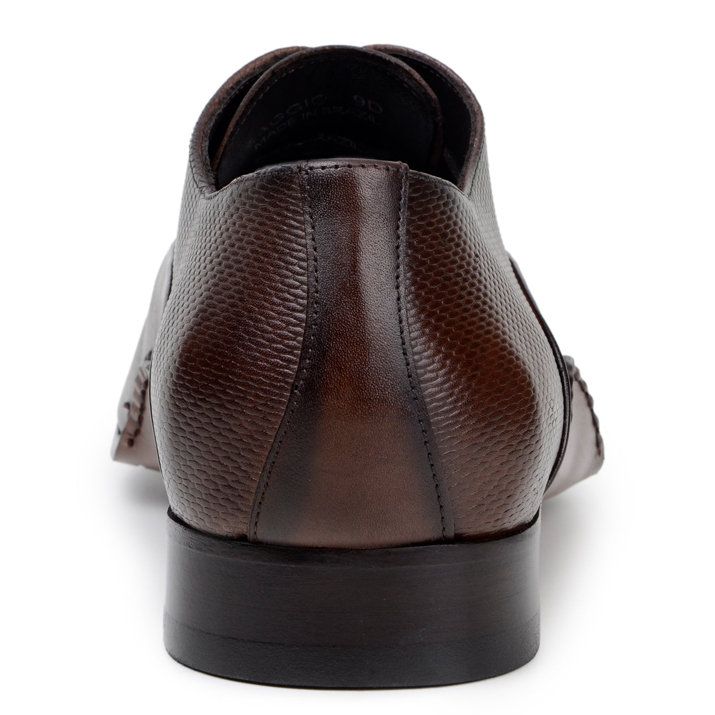 The BELVEDERE Saggio is an Ant. Tobacco Italian calf leather dress shoe with textured panels, toe perforations, a low heel, and handcrafted in Brazil with fine Opanka construction.