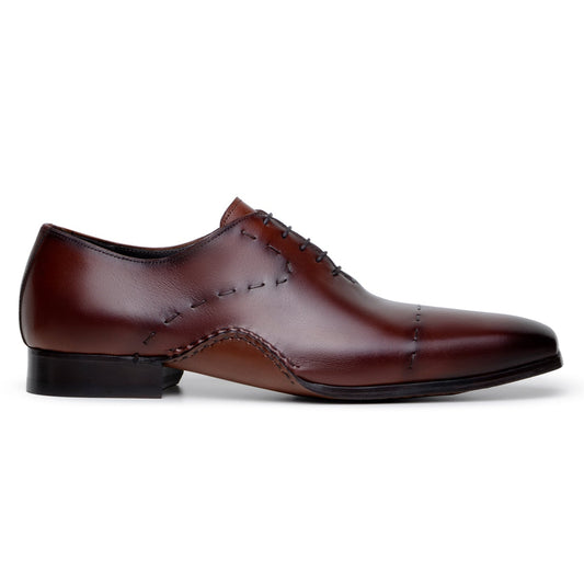 The BELVEDERE Belvedere - Maestro Italian Calf Dress Shoe in Antique Cognac features visible stitching, a low heel, sleek polished finish, and is handcrafted in Brazil from premium leather.