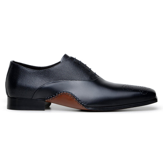 The BELVEDERE Saggio is a black Italian calf leather dress shoe with a textured upper, perforated toe, stitched leather sole, and cushioned insole, shown in a side view.