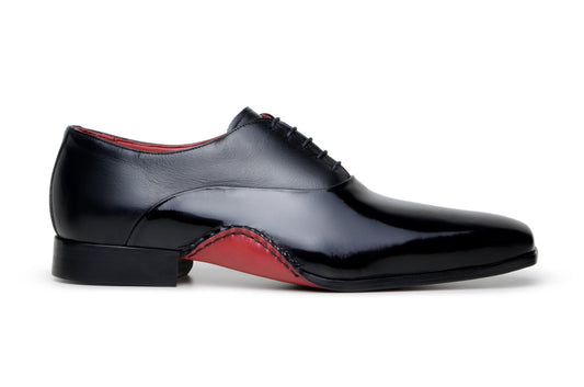 The BELVEDERE Belvedere - Nero is an Italian calf leather dress shoe in black, featuring a red interior lining and opanka red sole, shown side by side on a white background.