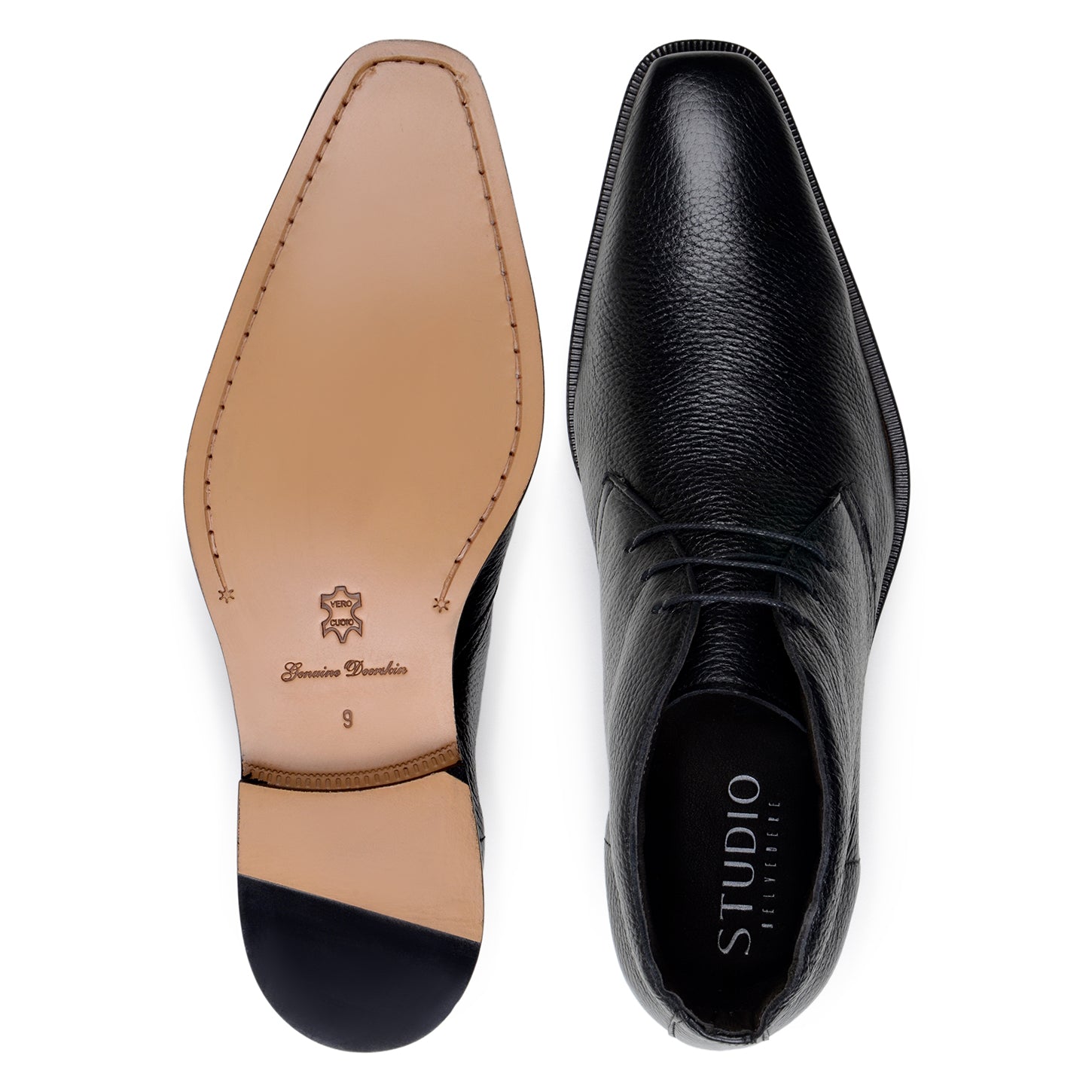 The BELVEDERE Axel is a black genuine Italian deerskin boot with a textured finish, minimal stitching, and a low heel, handcrafted in Brazil and shown in profile against a white background.