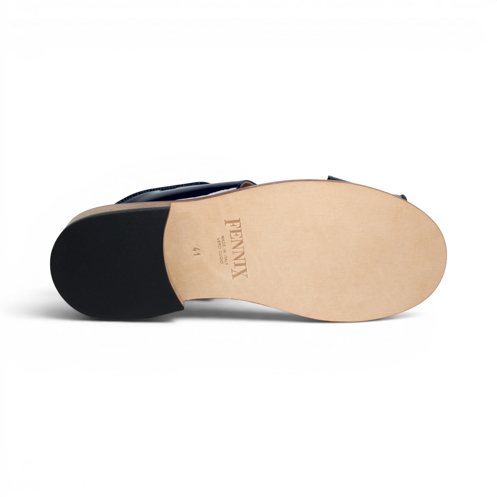 A side view of the Fennix Diego Blue sandal by Fennix of Italy, featuring a wooden sole, black patent leather sides, and a textured blue upper with intricate cut-out detailing—exemplifying the exotic luxury typical of Italian craftsmanship.
