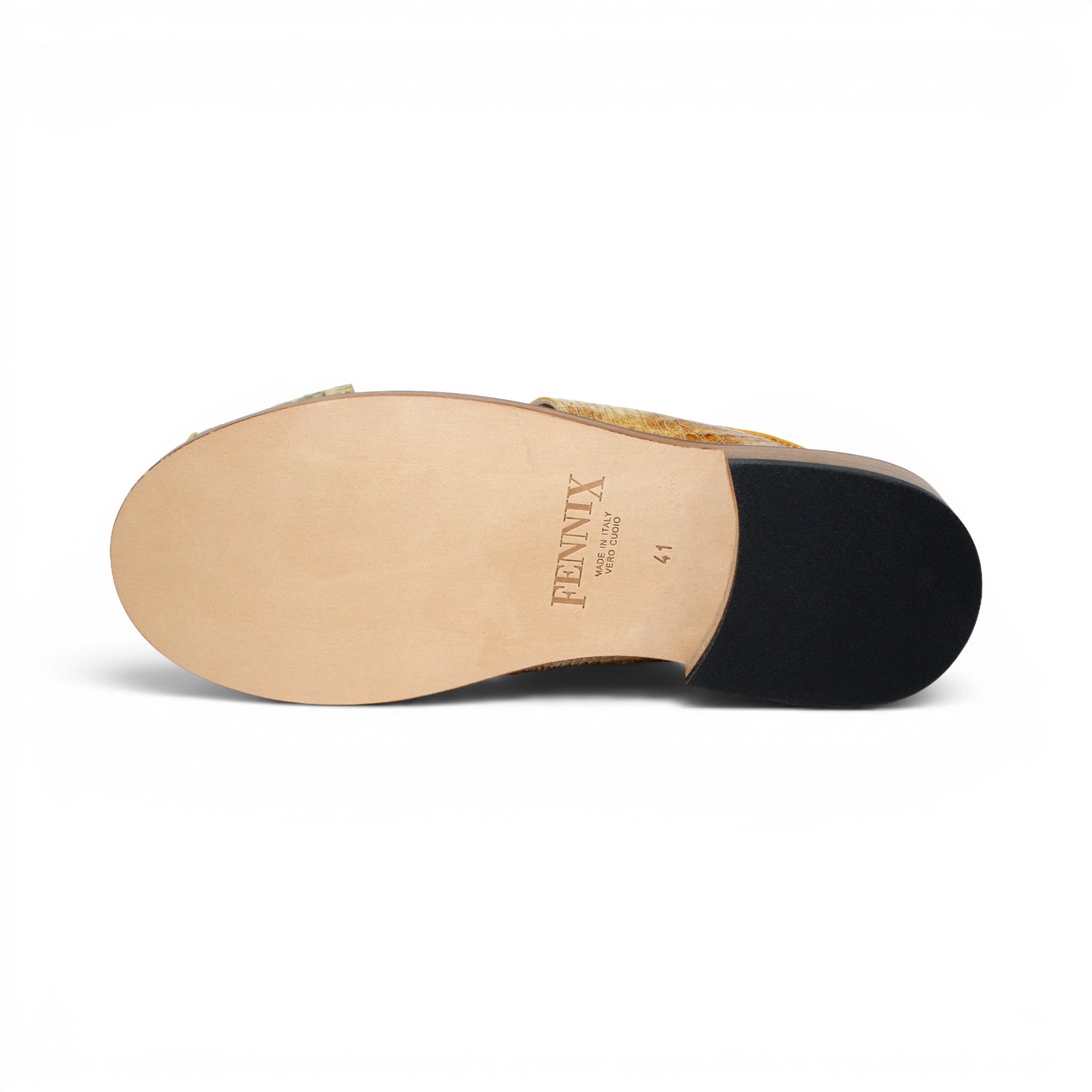 The Fennix Diego Yellow slide sandal by Fennix of Italy features yellow crocodile-embossed leather, an open toe, a wide strap, and a flat wooden sole—an eye-catching piece of exotic footwear inspired by Italian-made luxury shoes, shown from the side against a white background.