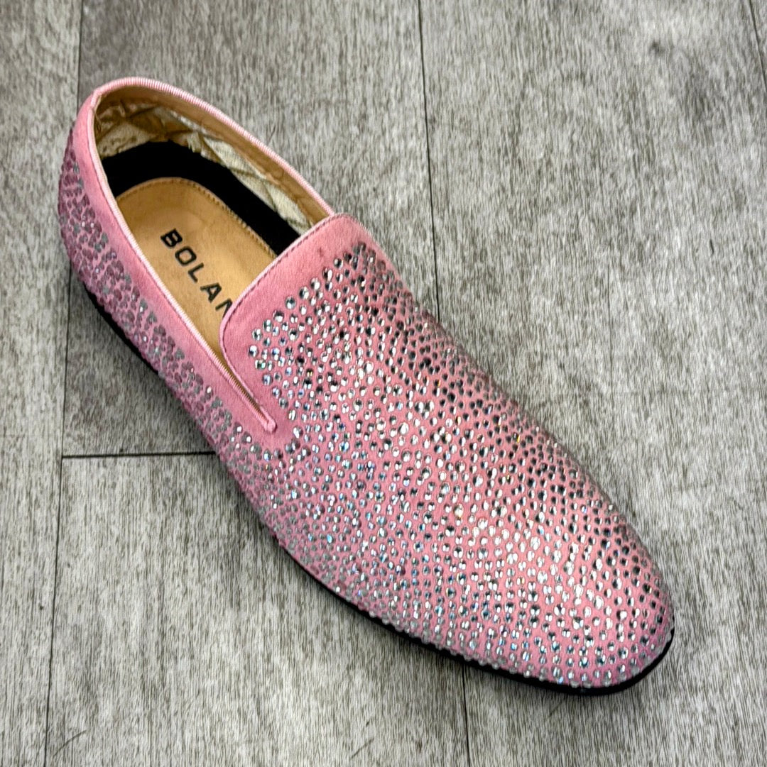 An Exclusive Formal Dress Shoe Pink SNYDER from UNIQUE DESIGN MENSWEAR, crafted from genuine leather with a sparkling, studded design, is showcased on a gray wood floor.