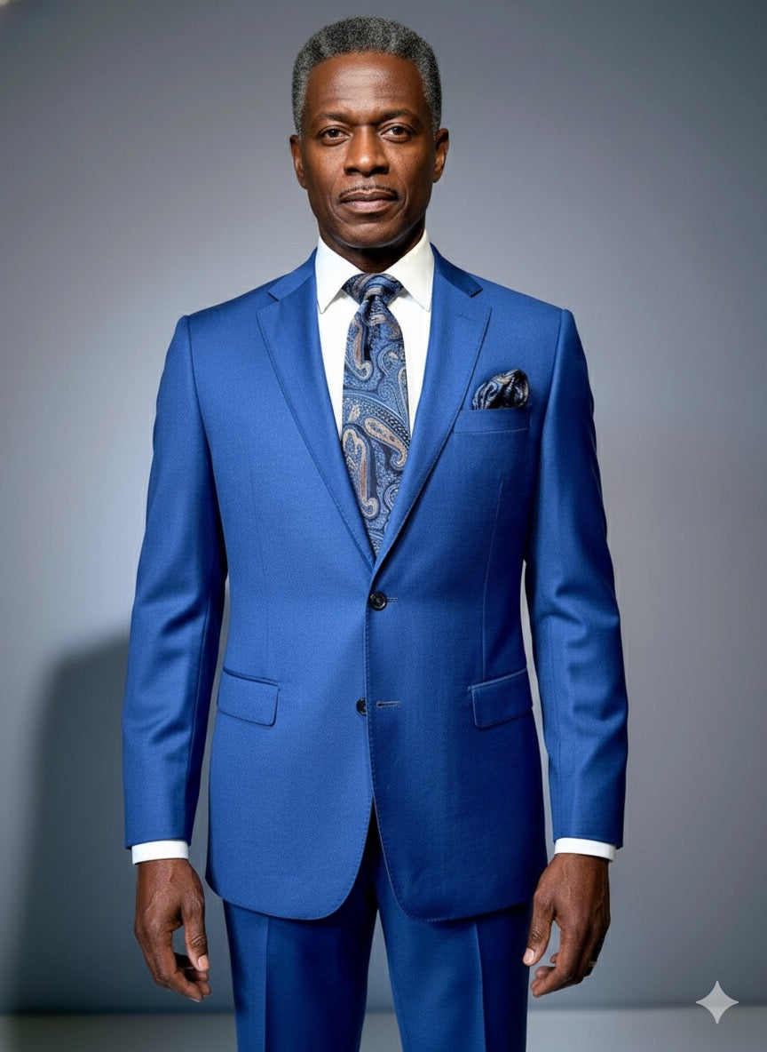 A mannequin wears the Cavellini Uomo Dolcetto MODERN FIT Suit 6667/121 by CAVELLI in royal blue, styled with a white shirt, paisley tie, and matching pocket square against a plain backdrop.