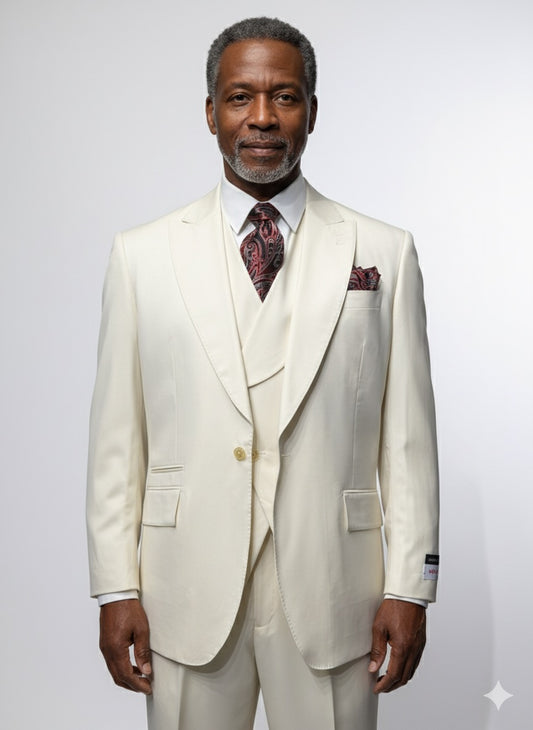 A man with short gray hair and a beard wears a Tiglio Rosso "New Rosso" Off White Wide Leg Pure Wool Suit & Vest TL2622, paired with a white shirt and patterned tie, standing against a plain light background.