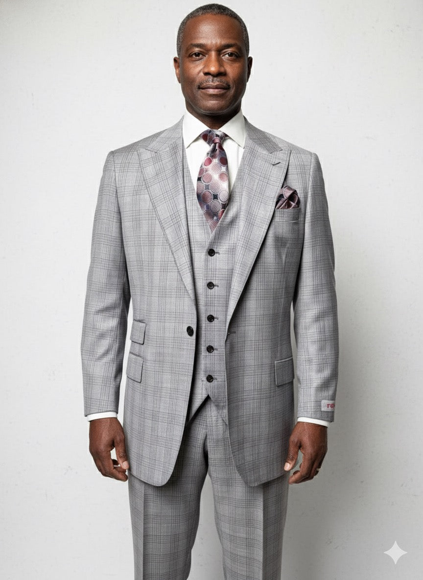 A mannequin indoors by wooden benches and a dark table wears a Tiglio Rosso Portofino Semi Wide Leg TL8059 suit, styled with a patterned tie and pocket square.
