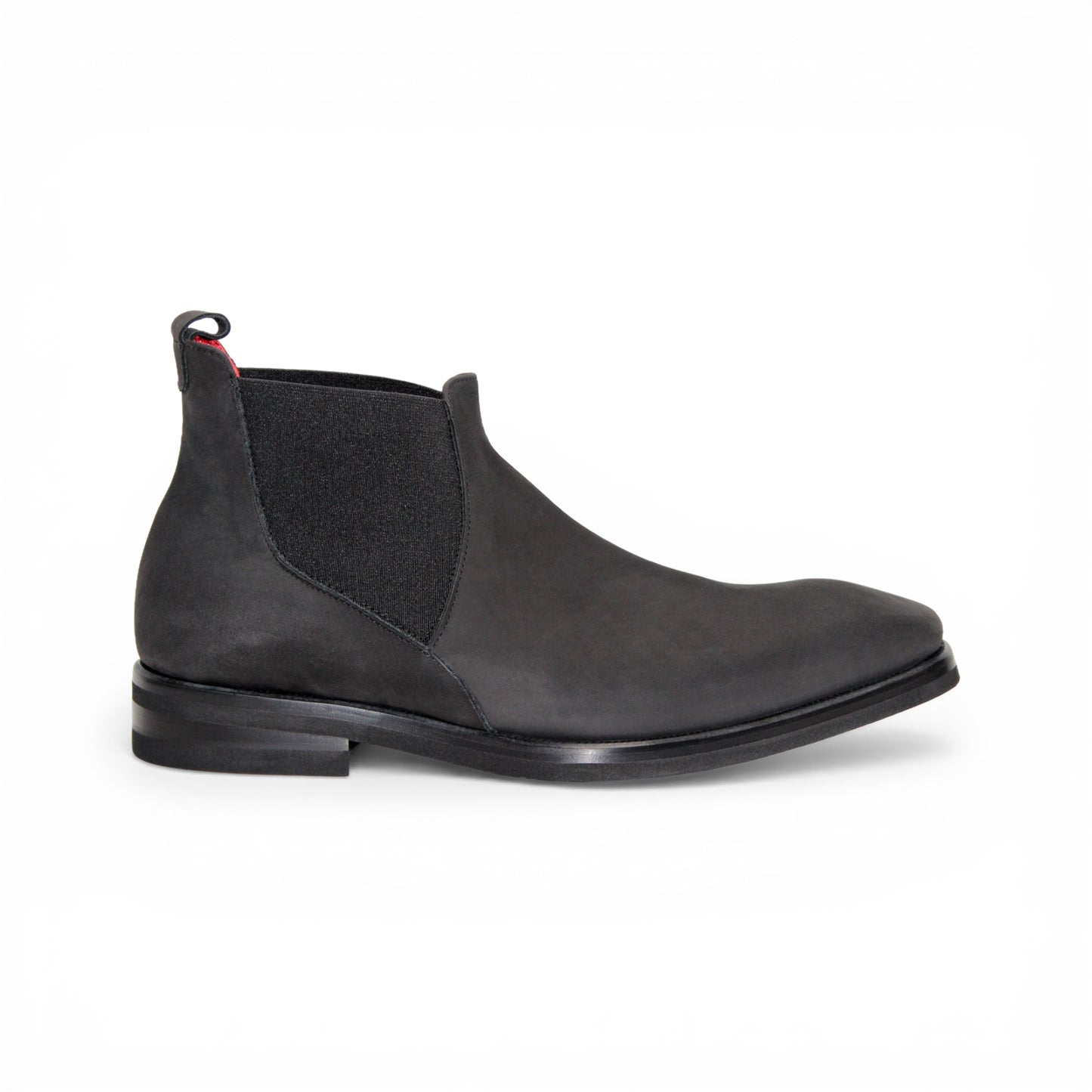 The Emilio Franco EF311 Black by Emilio Franco is a black leather Chelsea boot, featuring an elastic side panel and a low heel, shown in profile against a white background to showcase its casual elegance. Handcrafted in Italy and inspired by genuine Italian nabuk shoes, this versatile design blends timeless style with impeccable craftsmanship.