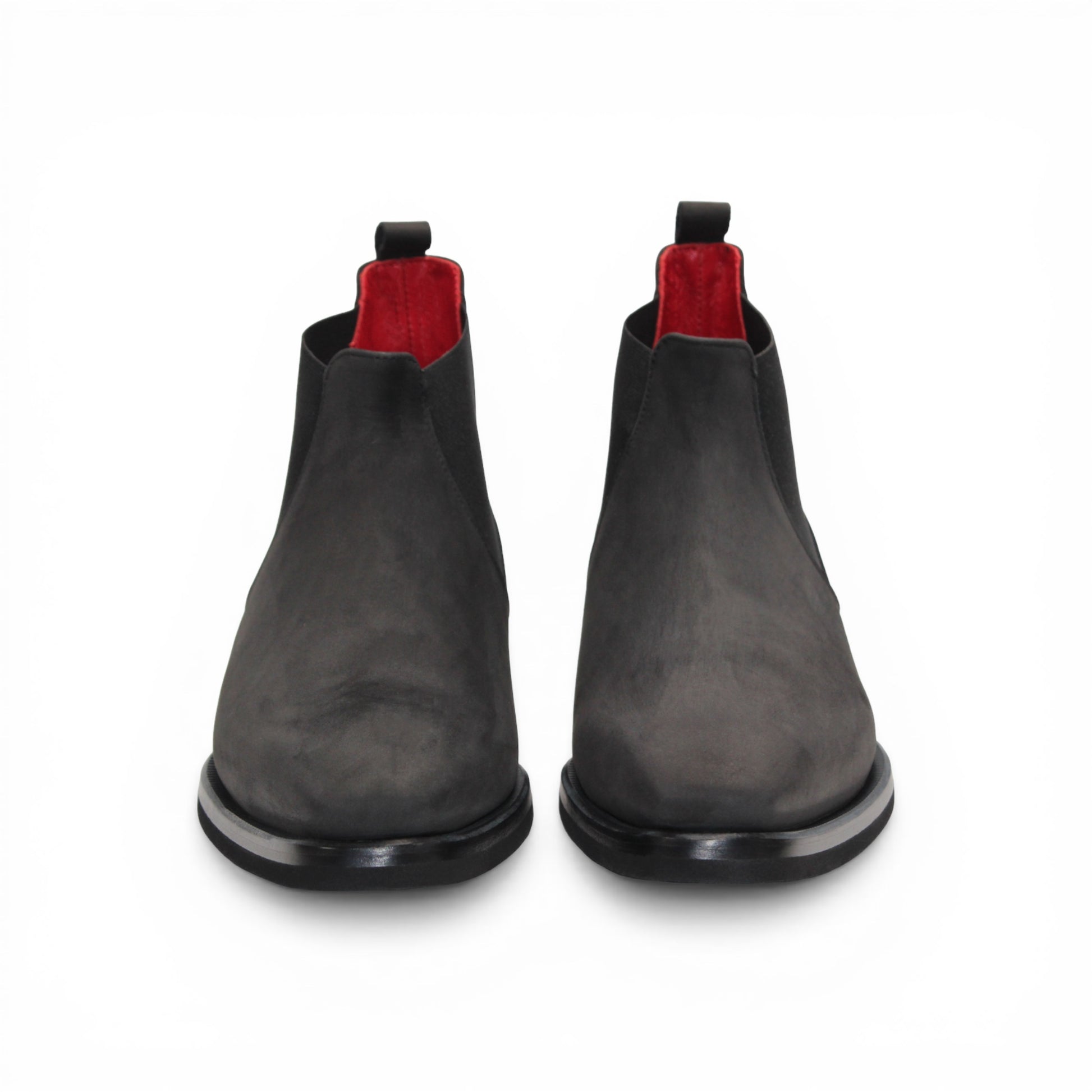 The Emilio Franco EF311 Black by Emilio Franco is a black leather Chelsea boot, featuring an elastic side panel and a low heel, shown in profile against a white background to showcase its casual elegance. Handcrafted in Italy and inspired by genuine Italian nabuk shoes, this versatile design blends timeless style with impeccable craftsmanship.